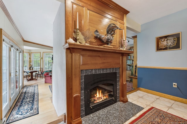 143 Petticoat Ln, East Haddam, CT 06423 - detailed view of a fireplace, ornamental molding, french doors, and baseboards