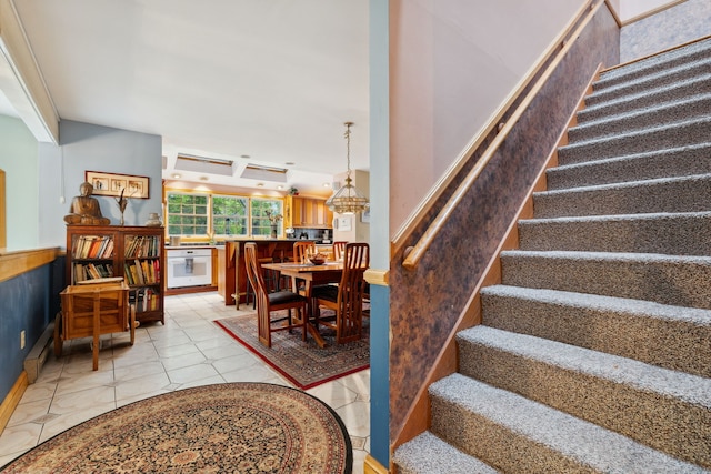 143 Petticoat Ln, East Haddam, CT 06423 - stairs with a chandelier and tile patterned flooring