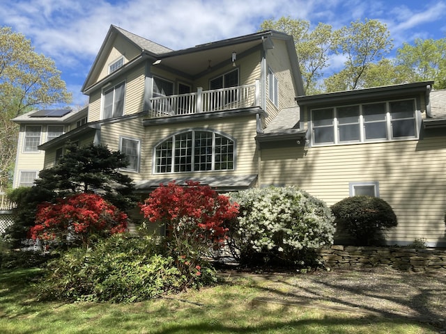 143 Petticoat Ln, East Haddam, CT 06423 - view of home's exterior featuring a balcony