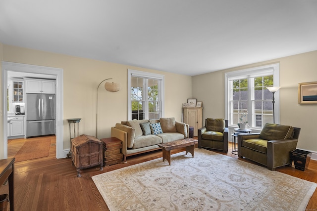 9 Rathbun Pl, Groton, CT 06355 - living room with plenty of natural light and wood finished floors