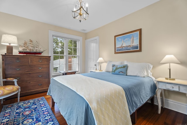 9 Rathbun Pl, Groton, CT 06355 - bedroom featuring wood finished floors and a chandelier