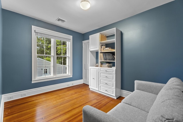 9 Rathbun Pl, Groton, CT 06355 - living area featuring wood finished floors and baseboards
