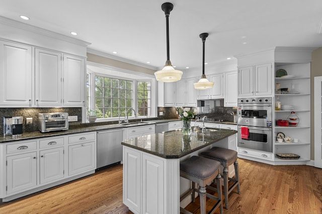 8 Hollow Oak Rd, Woodbridge, CT 06525 - kitchen featuring appliances with stainless steel finishes, open shelves, white cabinets, crown molding, and decorative backsplash