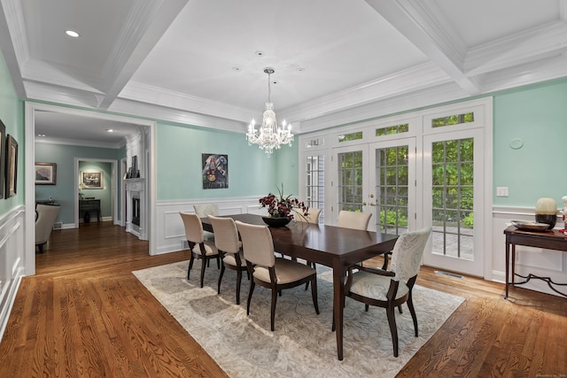 8 Hollow Oak Rd, Woodbridge, CT 06525 - dining area featuring ornamental molding, french doors, beam ceiling, coffered ceiling, and a chandelier