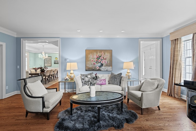 8 Hollow Oak Rd, Woodbridge, CT 06525 - living area featuring crown molding, a chandelier, wood finished floors, and recessed lighting