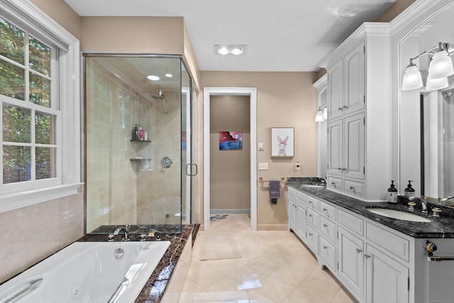8 Hollow Oak Rd, Woodbridge, CT 06525 - bathroom featuring a shower stall, double vanity, a whirlpool tub, and tile patterned floors