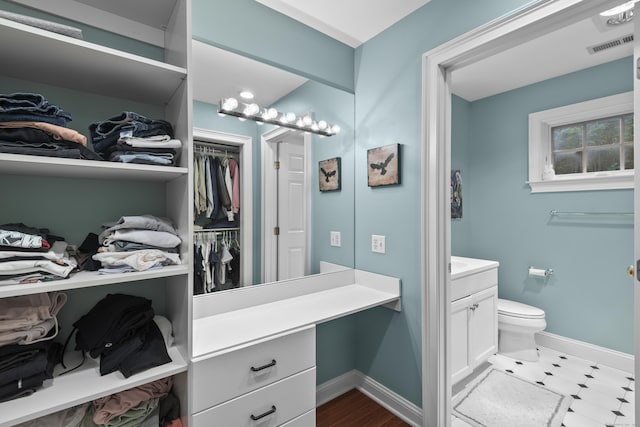 8 Hollow Oak Rd, Woodbridge, CT 06525 - bathroom with vanity and a spacious closet