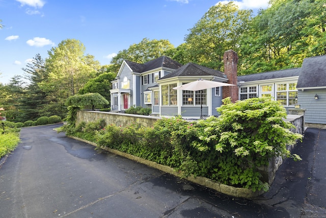 8 Hollow Oak Rd, Woodbridge, CT 06525 - view of front of house with a chimney
