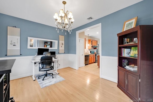 244 S St, Vernon, CT 06066 - office space featuring light wood finished floors and a chandelier