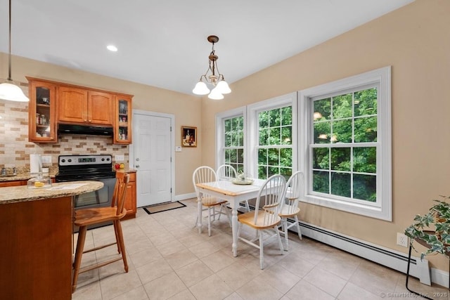 244 S St, Vernon, CT 06066 - dining space featuring a baseboard radiator, light tile patterned flooring, baseboards, and a chandelier
