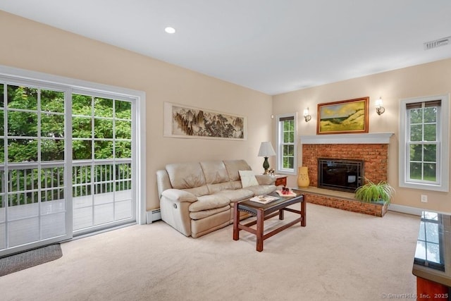 244 S St, Vernon, CT 06066 - carpeted living area featuring a brick fireplace and baseboard heating