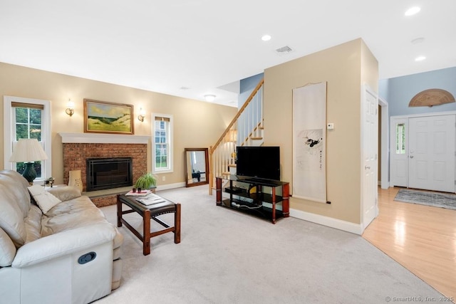 244 S St, Vernon, CT 06066 - living room with stairway, baseboards, light carpet, and recessed lighting