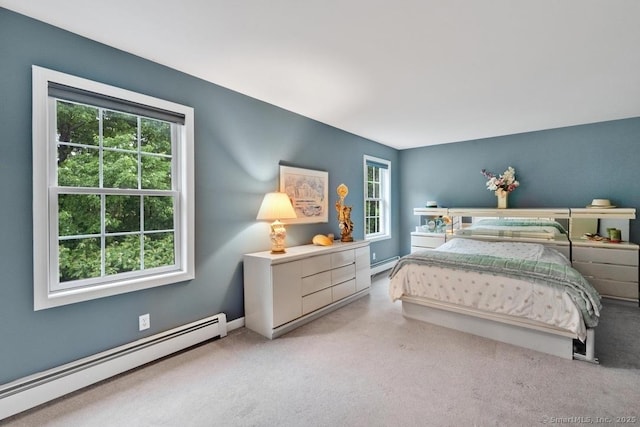 244 S St, Vernon, CT 06066 - carpeted bedroom with a baseboard heating unit
