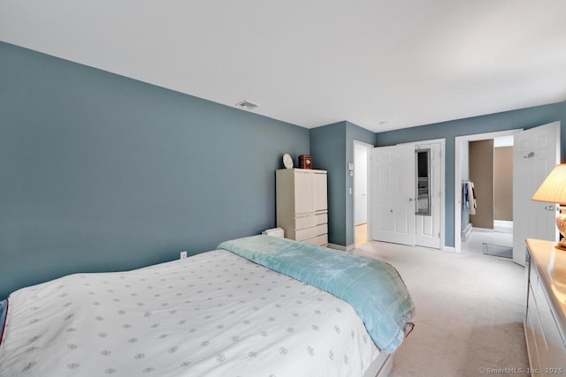 244 S St, Vernon, CT 06066 - bedroom with light colored carpet, baseboards, and a closet