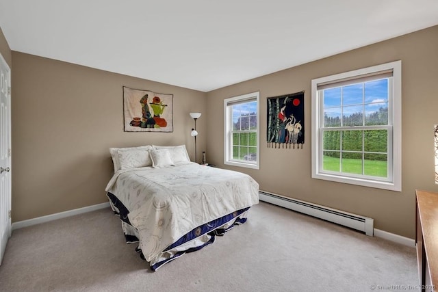 244 S St, Vernon, CT 06066 - carpeted bedroom featuring baseboard heating and baseboards