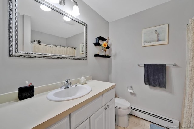 244 S St, Vernon, CT 06066 - bathroom featuring baseboard heating, vanity, toilet, and tile patterned flooring