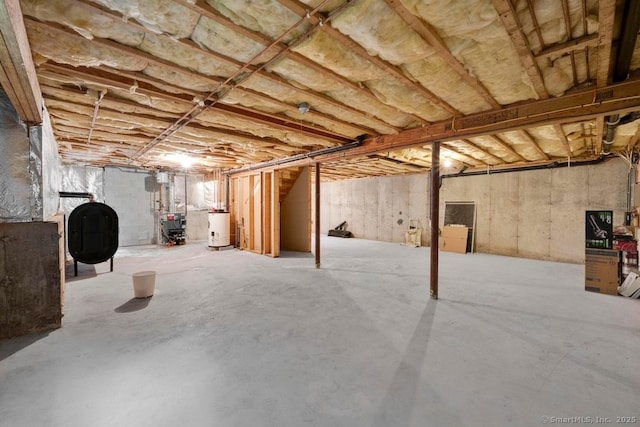 244 S St, Vernon, CT 06066 - unfinished basement featuring heating fuel, water heater, and a heating unit