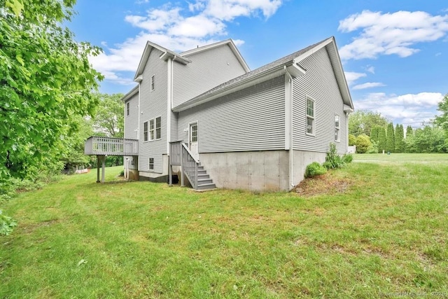 244 S St, Vernon, CT 06066 - back of property featuring a deck and a yard