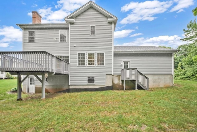 244 S St, Vernon, CT 06066 - back of property with a chimney, a yard, and a deck