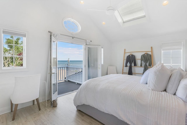 5 Compo Hill Ave, Westport, CT 06880 - bedroom with access to outside, a skylight, a water view, light wood finished floors, and vaulted ceiling