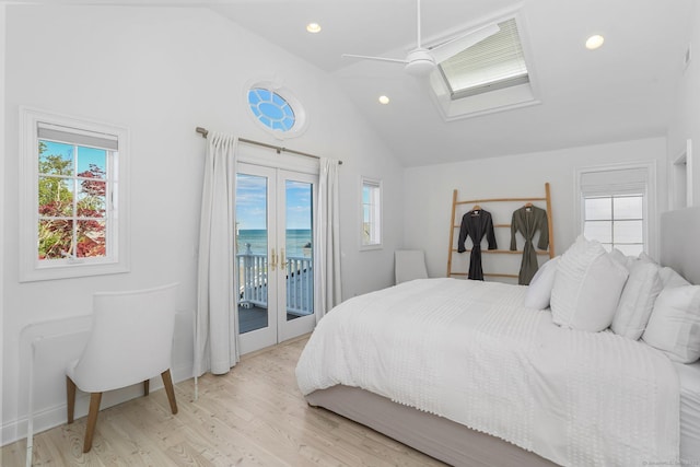 5 Compo Hill Ave, Westport, CT 06880 - bedroom with access to exterior, multiple windows, a skylight, light wood-style flooring, and recessed lighting
