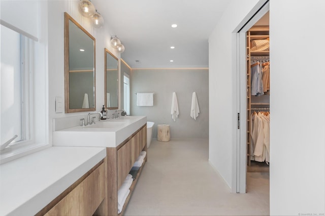 5 Compo Hill Ave, Westport, CT 06880 - bathroom with vanity, recessed lighting, and a spacious closet
