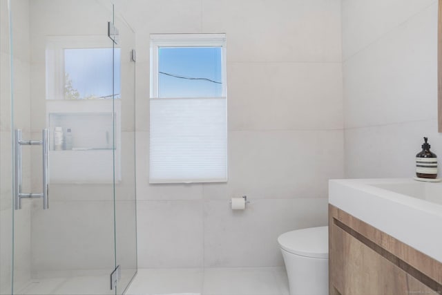 5 Compo Hill Ave, Westport, CT 06880 - full bathroom with a stall shower, tile walls, toilet, and vanity