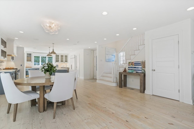 5 Compo Hill Ave, Westport, CT 06880 - dining area with light wood finished floors, stairway, and recessed lighting