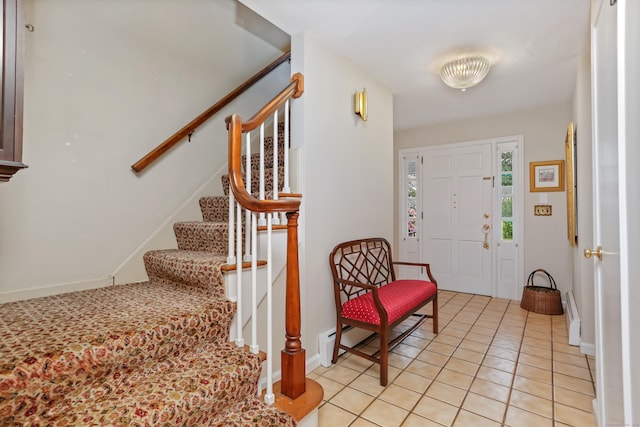 10 Crossland Pl, Norwalk, CT 06851 - entryway with stairway, light tile patterned floors, and baseboards