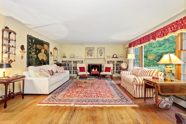 10 Crossland Pl, Norwalk, CT 06851 - living room with wood finished floors and a brick fireplace