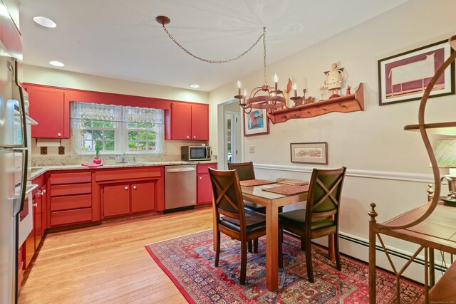 10 Crossland Pl, Norwalk, CT 06851 - dining space with light wood-style floors, a chandelier, baseboard heating, and recessed lighting