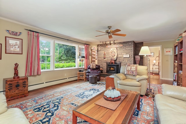 10 Crossland Pl, Norwalk, CT 06851 - living room with a baseboard radiator, ceiling fan, wood finished floors, ornamental molding, and baseboards