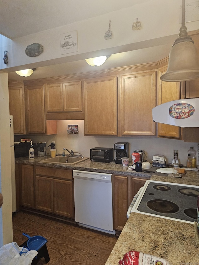 19 Polpis Ln Unit 19, Guilford, CT 06437 - kitchen featuring white appliances, a sink, dark wood finished floors, and exhaust hood