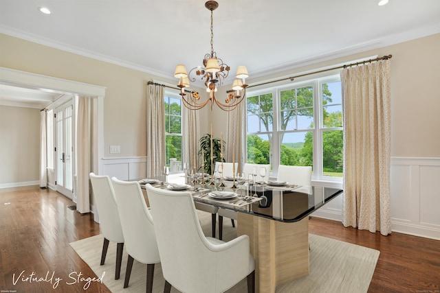 128 Chestnut Hill Rd, Killingworth, CT 06419 - dining space featuring a decorative wall, a chandelier, ornamental molding, a wainscoted wall, and dark wood-type flooring