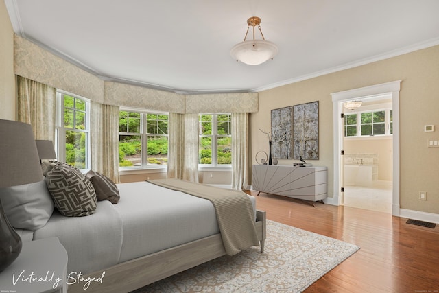 128 Chestnut Hill Rd, Killingworth, CT 06419 - bedroom featuring ornamental molding, wood finished floors, and connected bathroom