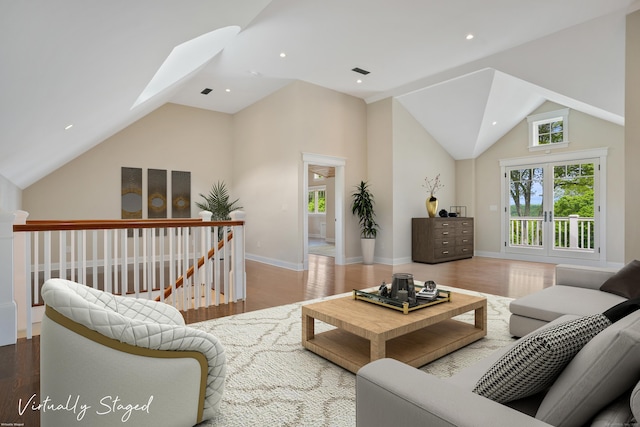 128 Chestnut Hill Rd, Killingworth, CT 06419 - living room with a skylight, high vaulted ceiling, wood finished floors, and recessed lighting
