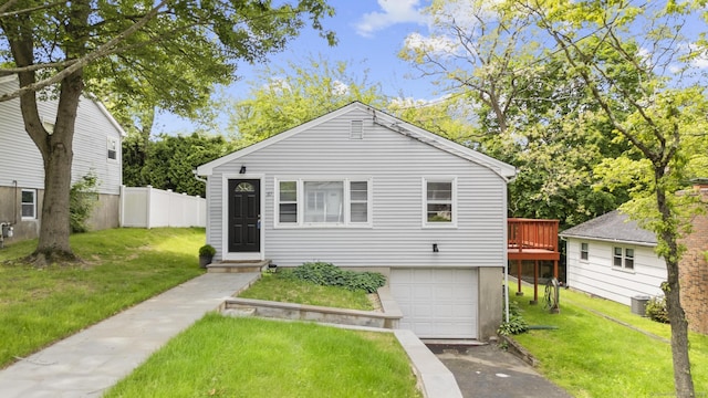 37 Rena Pl, Fairfield, CT 06825 - view of front of house featuring an attached garage, concrete driveway, and a wooden deck