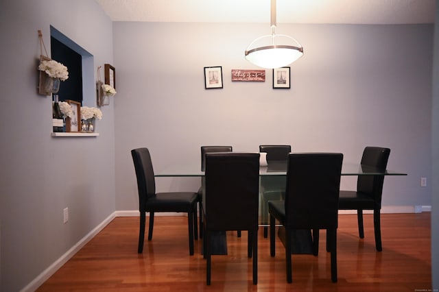 196 New Haven Ave Unit 217, Derby, CT 06418 - dining area featuring wood finished floors and baseboards