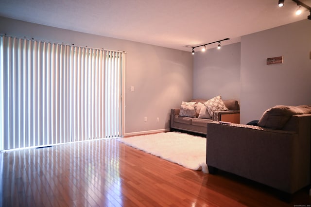 196 New Haven Ave Unit 217, Derby, CT 06418 - living area with rail lighting and wood finished floors