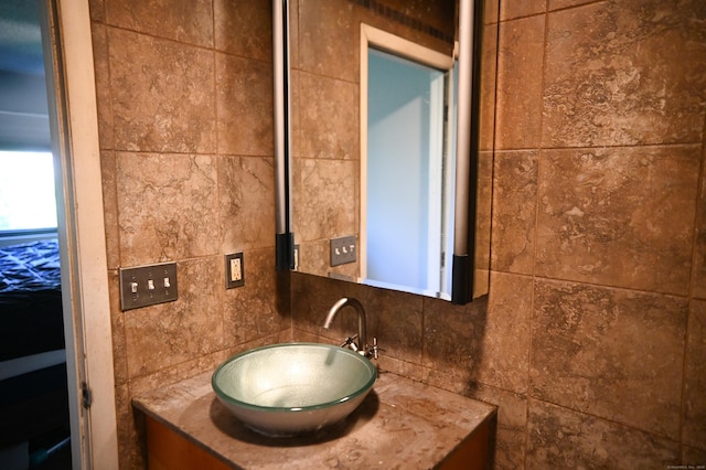 196 New Haven Ave Unit 217, Derby, CT 06418 - bathroom featuring tile walls, vanity, and decorative backsplash