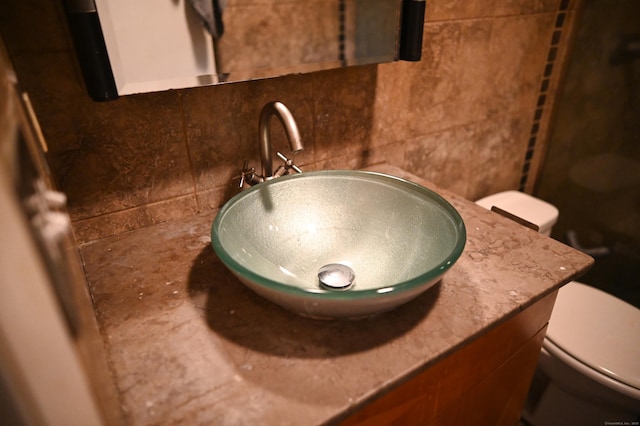 196 New Haven Ave Unit 217, Derby, CT 06418 - bathroom view of toilet, vanity, and backsplash