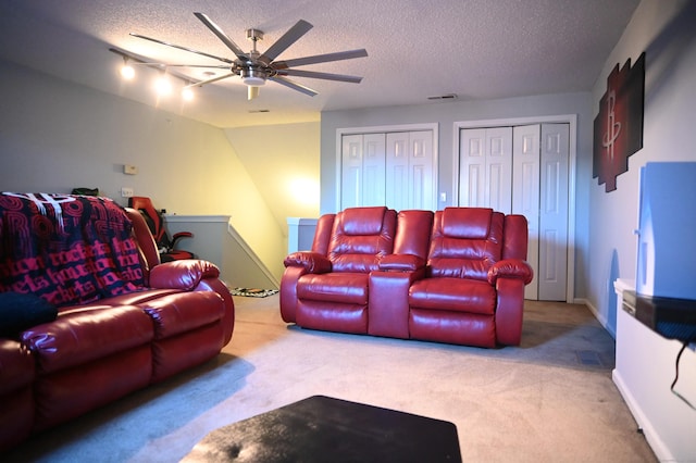 196 New Haven Ave Unit 217, Derby, CT 06418 - carpeted home theater with a ceiling fan and a textured ceiling