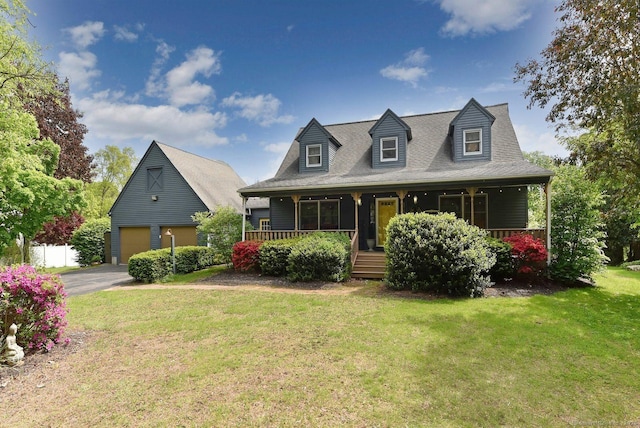 60 Haddam Neck Rd, East Hampton, CT 06424 - cape cod home featuring a garage, a porch, a front lawn, and driveway
