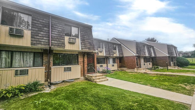 300 High Path Rd Unit 300, Windsor, CT 06095 - view of front facade with a front yard and brick siding