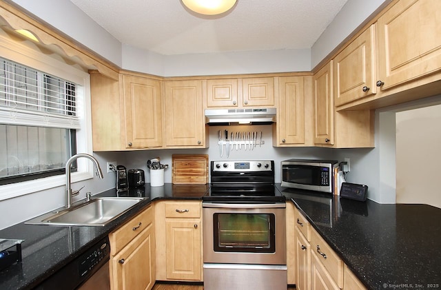 198 Mattabasset Dr Unit 198, Meriden, CT 06450 - kitchen with stainless steel appliances, under cabinet range hood, a sink, and light brown cabinets