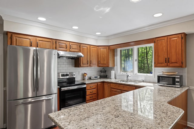 6 Middlebrook Pond Rd, Redding, CT 06896 - kitchen featuring appliances with stainless steel finishes, a sink, under cabinet range hood, brown cabinetry, and recessed lighting