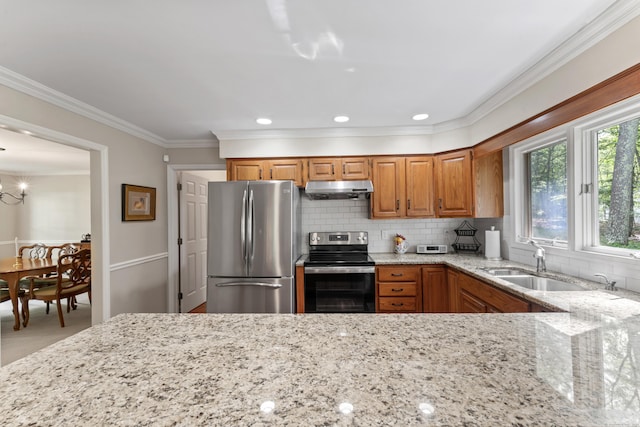 6 Middlebrook Pond Rd, Redding, CT 06896 - kitchen featuring appliances with stainless steel finishes, under cabinet range hood, light stone counters, ornamental molding, and tasteful backsplash