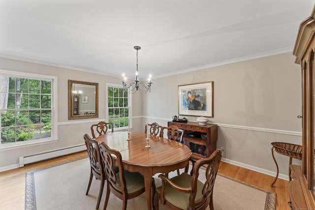 6 Middlebrook Pond Rd, Redding, CT 06896 - dining room featuring a baseboard heating unit, light wood finished floors, a chandelier, ornamental molding, and healthy amount of natural light