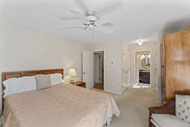 6 Middlebrook Pond Rd, Redding, CT 06896 - bedroom with light colored carpet, baseboards, connected bathroom, and ceiling fan