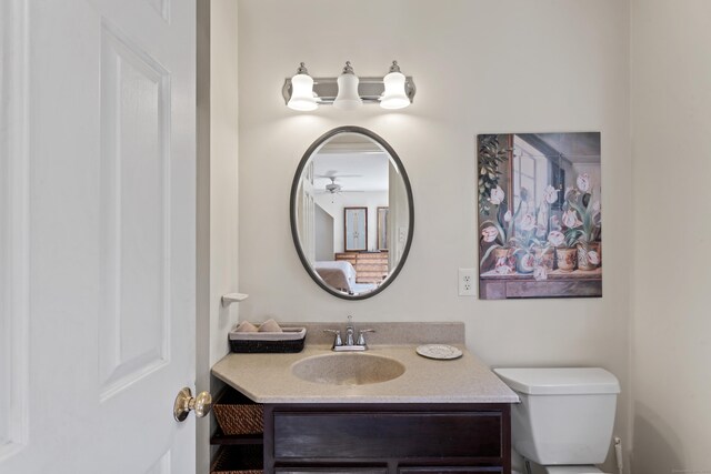 6 Middlebrook Pond Rd, Redding, CT 06896 - half bathroom with vanity, toilet, and ceiling fan